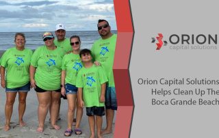 Orion team members at beach cleanup